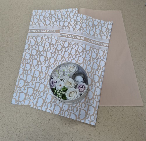 Dior wrapping paper gold white