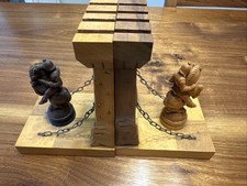 Pair of carved wooden bookends