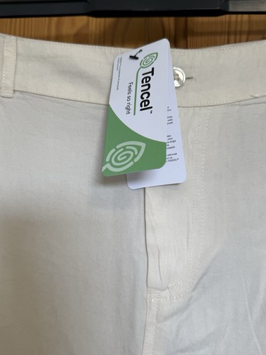 Beige trousers featuring - beige,