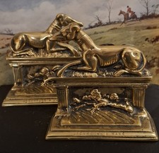 A pair of heavy brass door stops of working greyhound or hare coursing interest