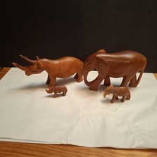 Wood Carvings Of 2 Rhino's And 2 Elephants, 1large And 1 Small Of Each