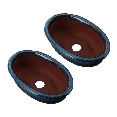 Pair blue ceramic planters - blue,