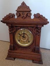 Vintage carved wooden  striking 8 day pendulum clock by Ansonia  for restoration