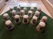 A Set Of 16 Porcelain Thimbles