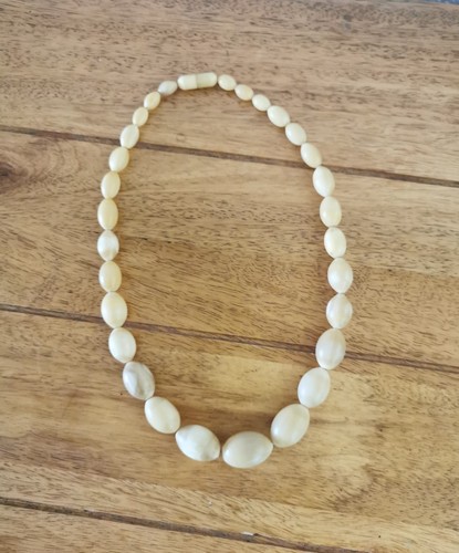 Vintage oval horn - oval, beaded