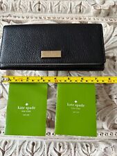 Brand New Kate Spade Bi fold wallet purse. Black outer leather & cream interior.