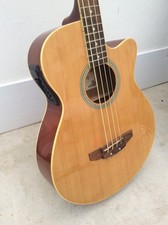 4 string short scale electro acoustic bass guitar used