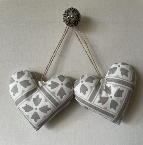 Pair heart door hangers in - of,