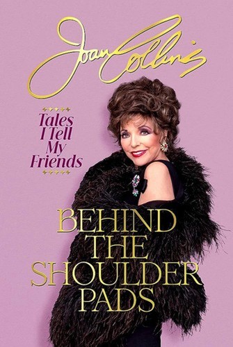 Behind the shoulder pads - behind,