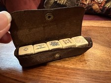 Vintage poker dice set in leather case — 5 plastic dice c1930s–50s