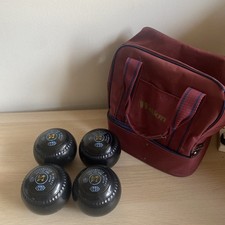 A set of four GREENMASTER PRO-LINE BOWLS, SIZE 0 With Welkin Made in England Bag