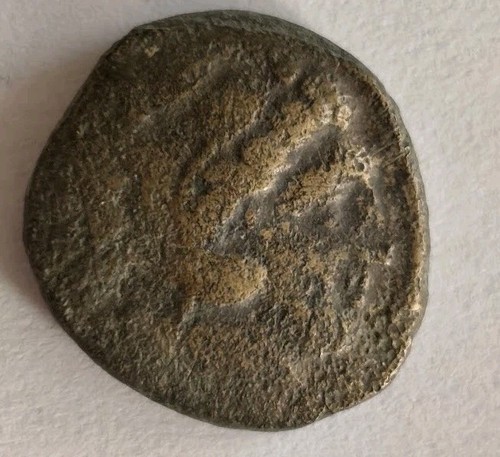 Ancient greek bronze coin with - greek,