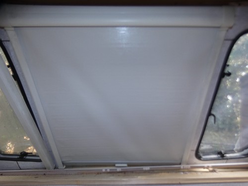 Caravan blind with insect