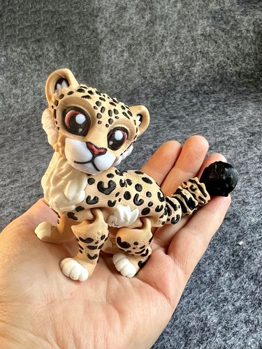 Articulated cute snow leopard