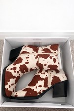 Women's Cow Print Pony Skin