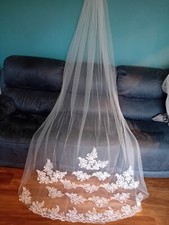 Ivory single tier chapel length veil with comb slide lace edge v377