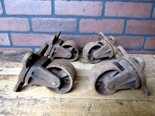 Four vintage antique cast - four, iron