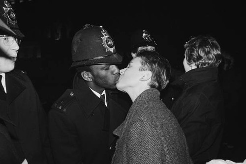 Police officer kissing young - police, a