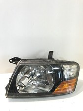 Mitsubishi Pajero Left Side Headlight 100-87507 Genuine 2004 Rhd