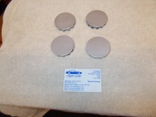 Ford Capri 2.8i. Pepperpot wheel centre caps x 4