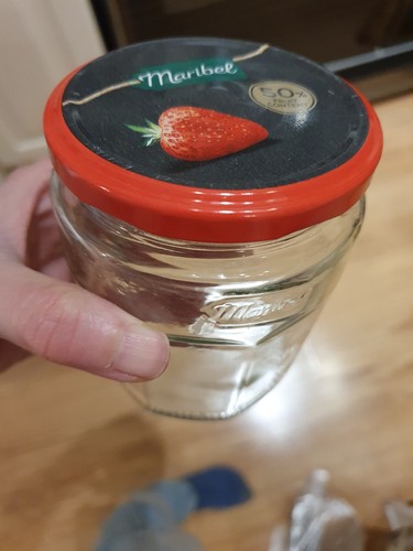 Empty used mixed glass jam - used,