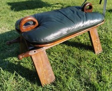 Moroccan camel saddle stool exquisitely crafted. Leather mahogany brass inlay.