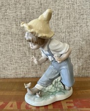 Nao by LLADRO Figurine A Boy with Birds. Little Visitors 1096