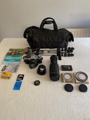 Canon with accessories - ae-1,