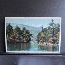 Antique Launch Boat Among