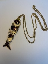 articulated fish pendant