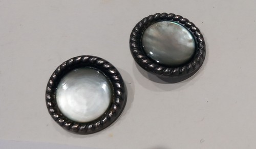 Pair vintage metal buttons - of,