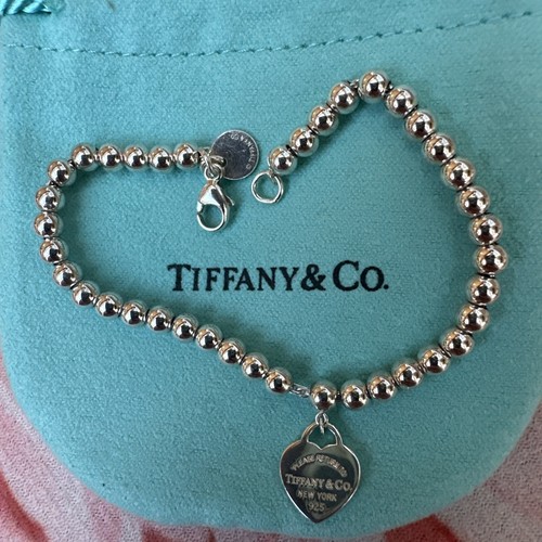 Please return tiffany - tiffany, co