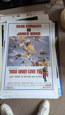 1967 YOU ONLY LIVE TWICE reproduction plus 11 other James Bond posters.