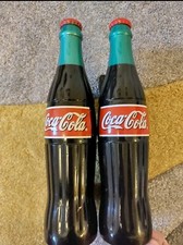 Coke Cola Cast Iron Bottle