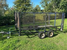 Trailer Twin Axle 10ft X 5.5 Ft Unbraked Mesh Sides And Ramp. Needs floor board