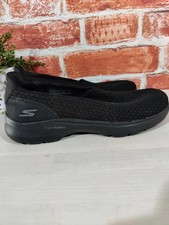 Women's black fabric Skechers
