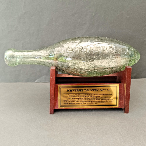 Schweppes drunken bottle with - schweppes,
