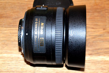 Nikon 35 mm F/1.8 G ED AF-S Lens with caps and hood