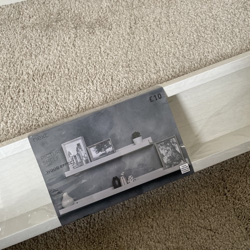 Next white picture - shelf, wood