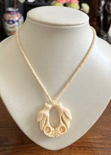 Vintage Carved Celluloid Kissing Bird Pendant Necklace with Puzzle Ball Detail