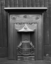 ANTIQUE CAST IRON FIREPLACE