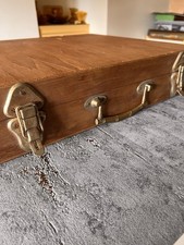 A vintage canteen of Thai nickel plated bronze cutlery in a teak box, 48cm wide.