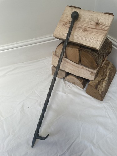 Handmade fire poker with log - fire,
