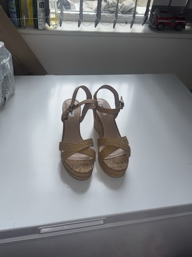 Tan cork platform sandals with