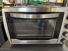 Stainless Steel Electric Oven With Two Top Burners.