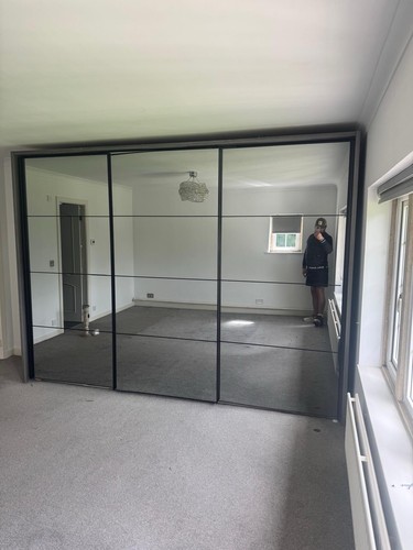 Mirrored sliding wardrobes - mirrored,