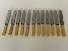 SET OF 12 COMPOSITE HANDLED