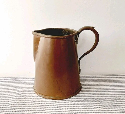 Lovely rustic copper jug - lovely,