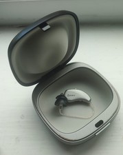 Widex Moment Sheer sRIC hearing aid (LEFT) with charger, case and power supply.