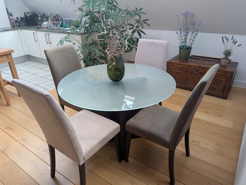 Circular glass dining table